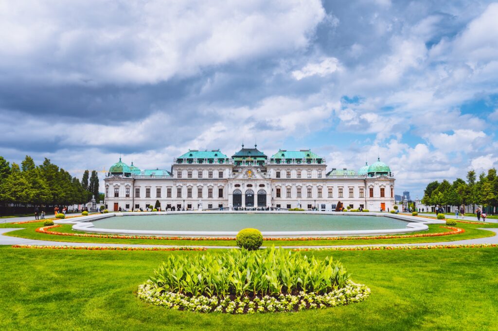 Belvedere palace Vienna Austria with spring flowers and cloudscape