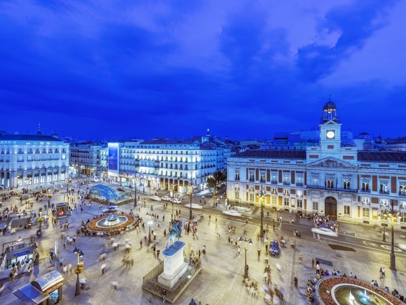 Ornate buildings illuminated at night, Madrid, Madrid, Spain